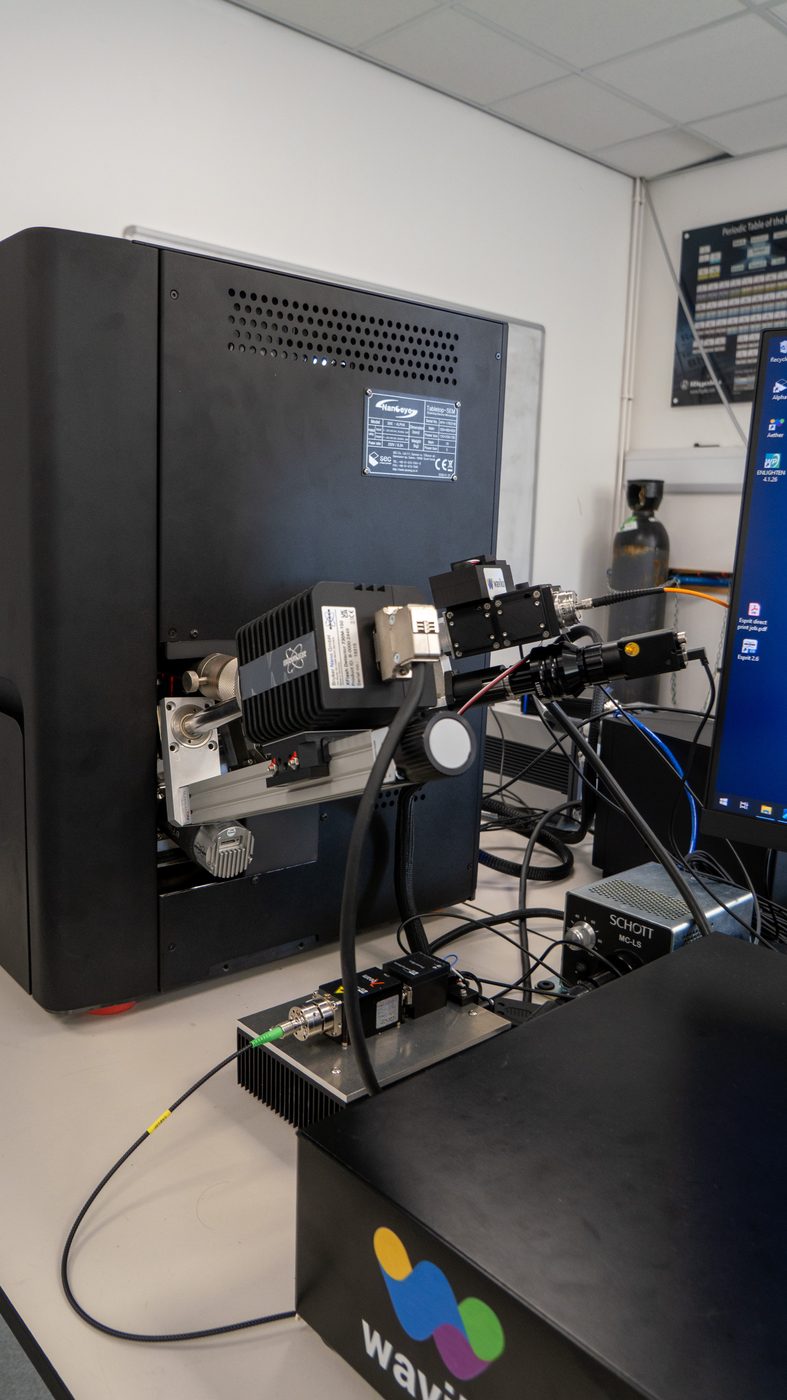 Close-up of Waviks optical hardware on a tabletop SEM configuration